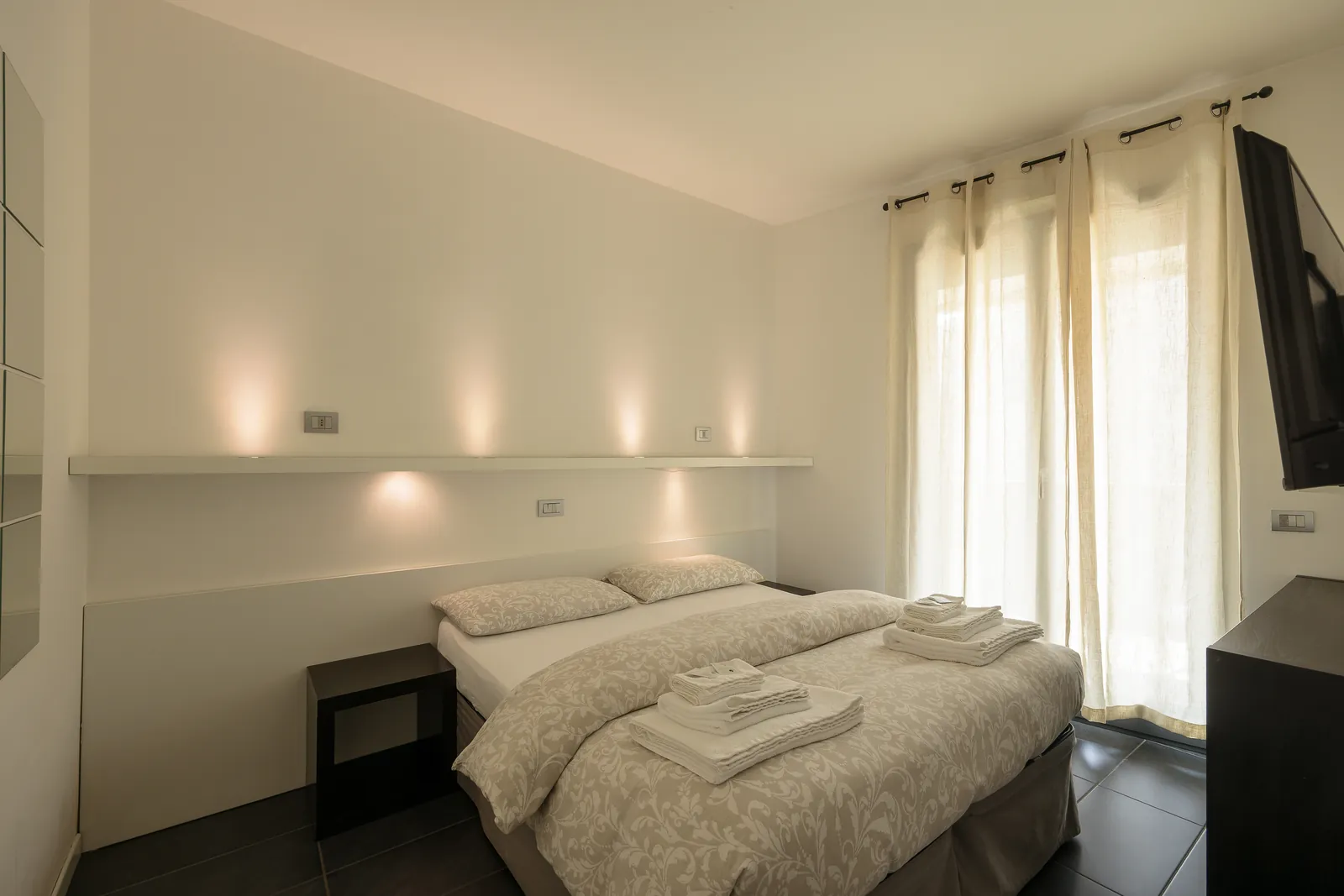 Camera da letto matrimoniale dell'appartamento Deluxe